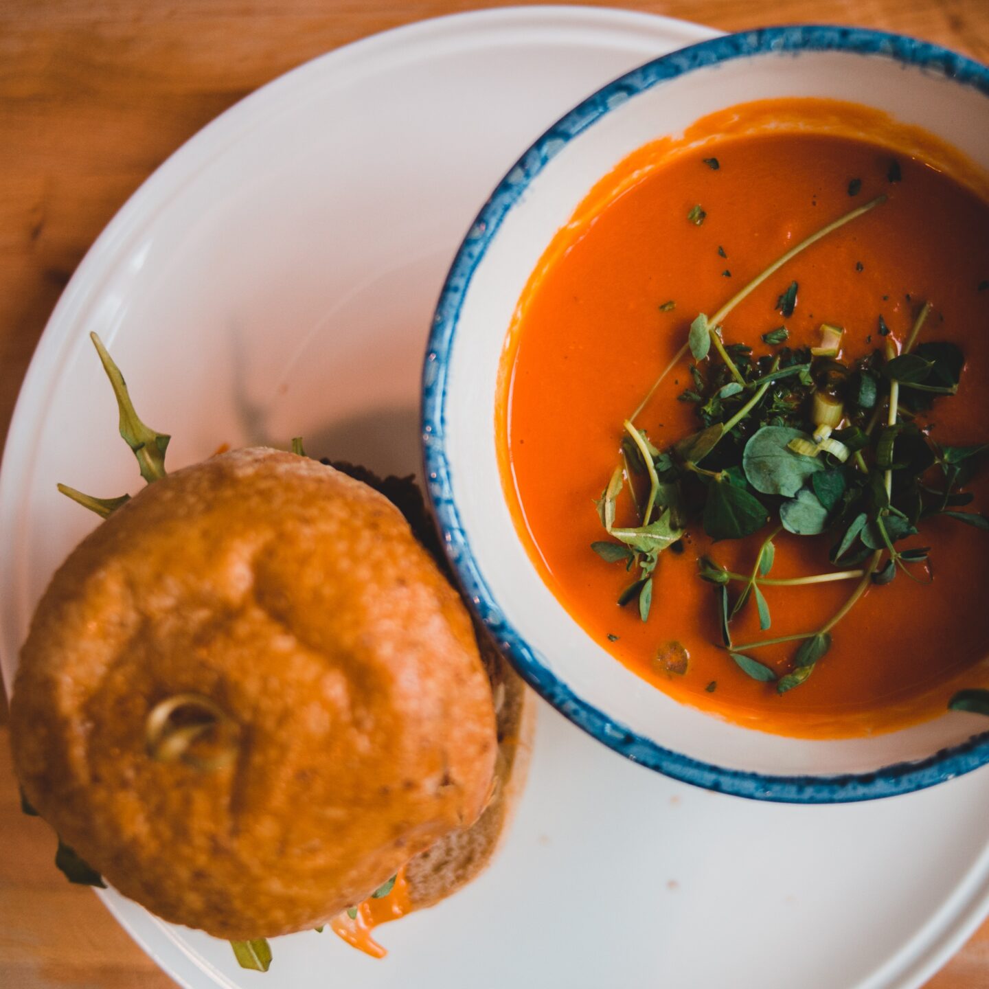 Photo by Erik Mclean: https://www.pexels.com/photo/crispy-hamburger-and-bright-tomato-soup-in-cafe-4062274/